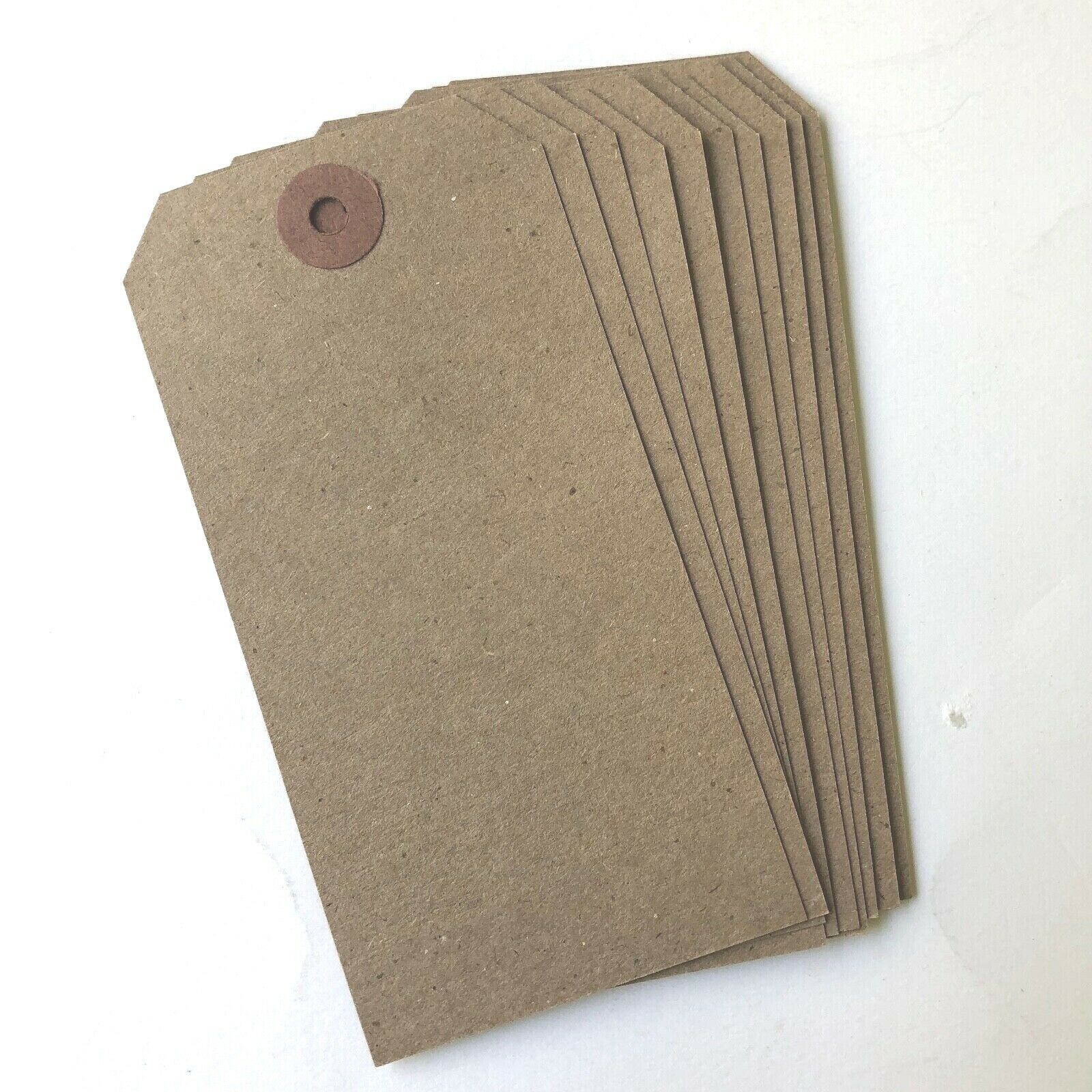 30 Kraft Brown Tags W/rust Color Hole Reinforcements  4 3/4” X 2 3/8”.